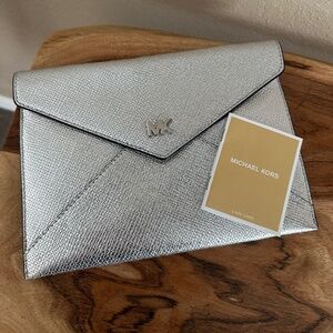 Michael Kors sleeve purse. Silver.